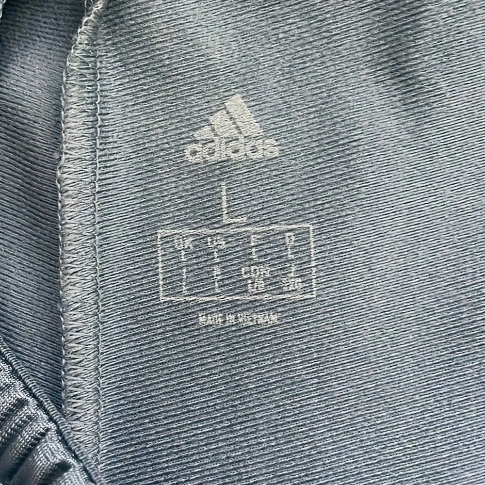 Adidas Men’s Joggers. Blue/grey color with black stripes.